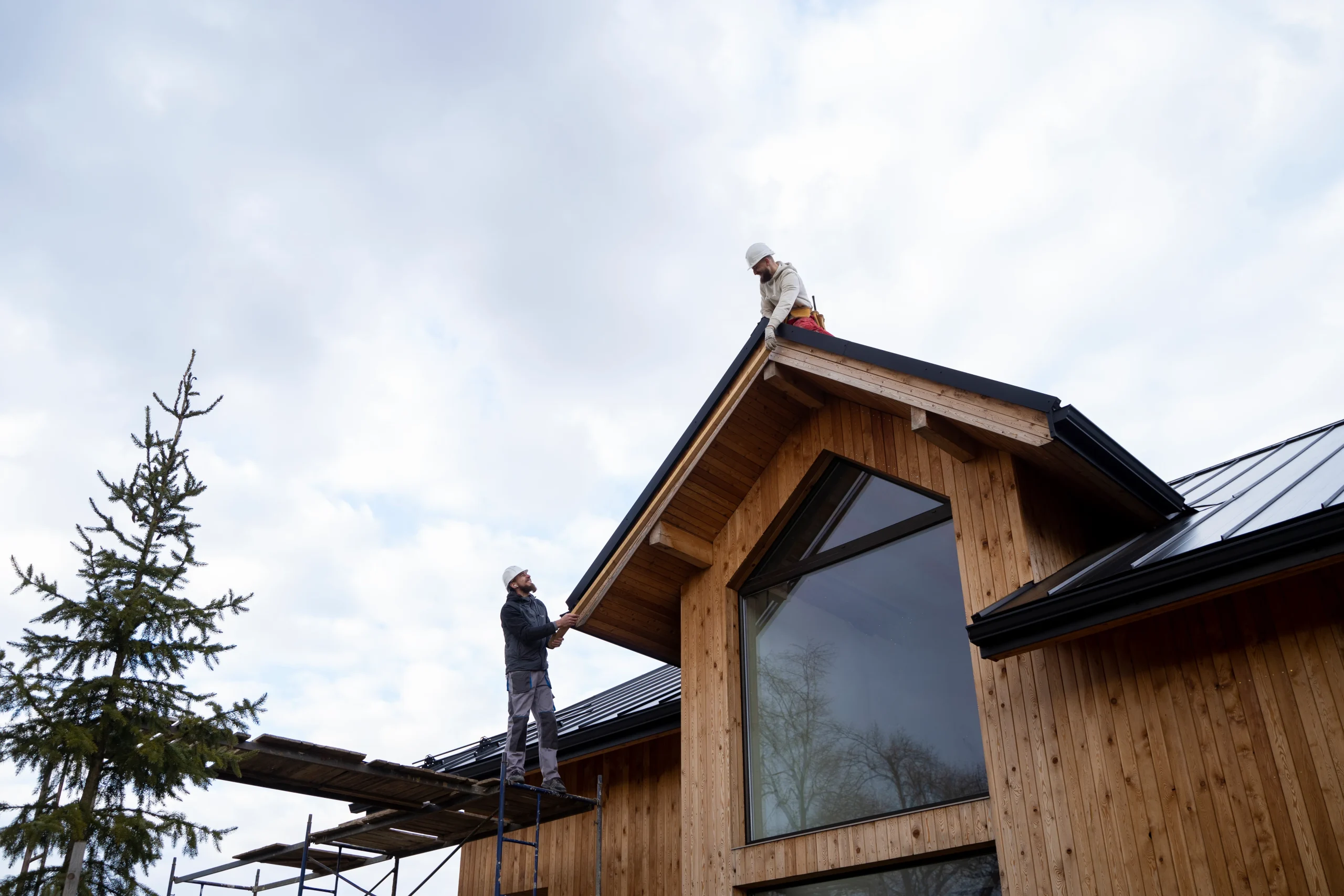 long-shot-men-working-roof-together